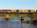 3 boxcars on the bridge